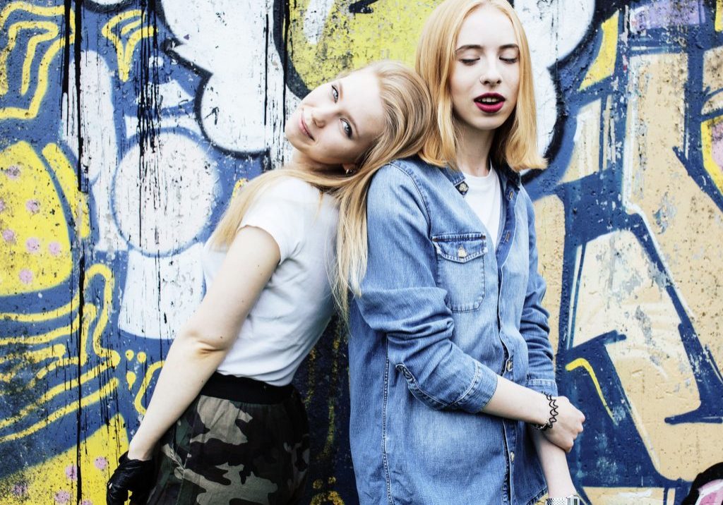 65386366 - two blonde real teenage girl hanging out at summer together best friends, lifestyle people concept close up